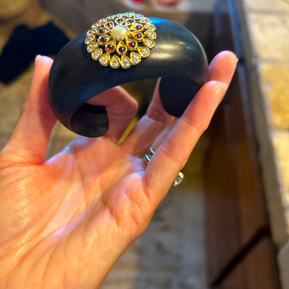 Isharya sunburst center wood cuff. Size medium.